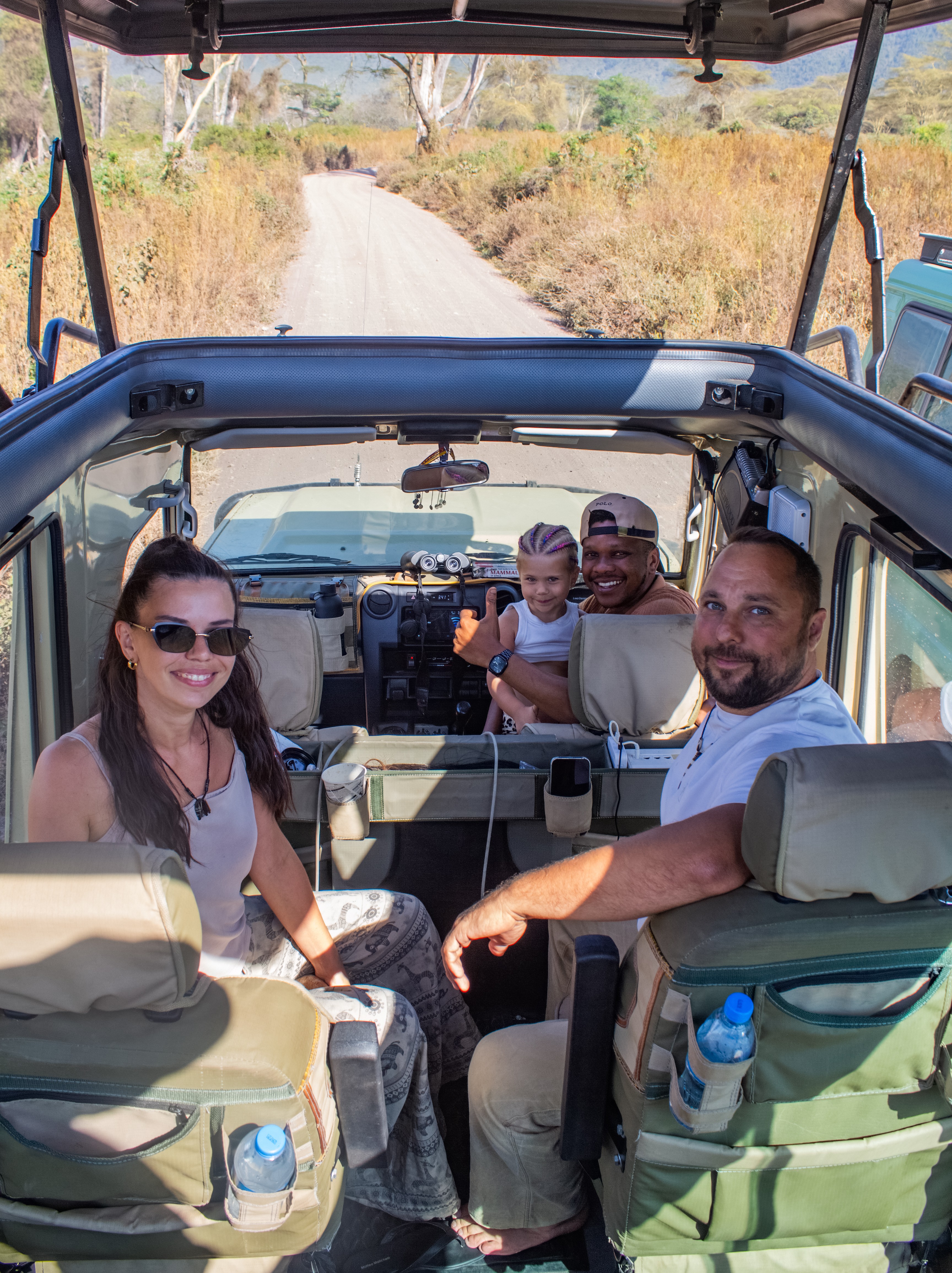 Family on safari with a guide