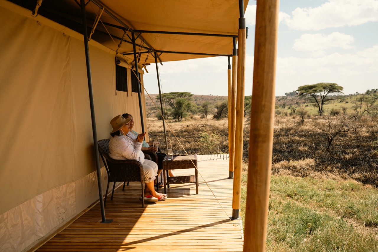 Guests enjoying Jackals' Lair Camp in central Serengeti