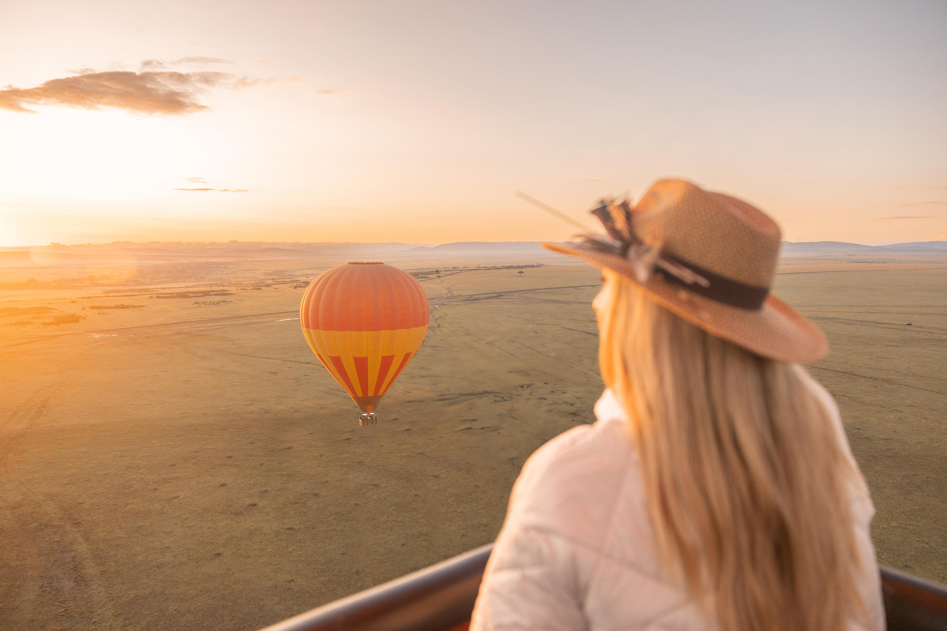 Balloon safari over the Serengeti — migration wildebeest from above