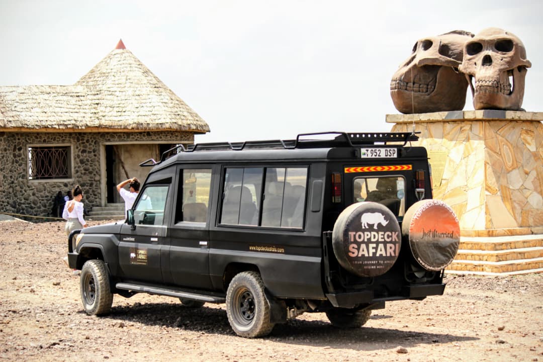 Safari vehicle on the road in Tanzania